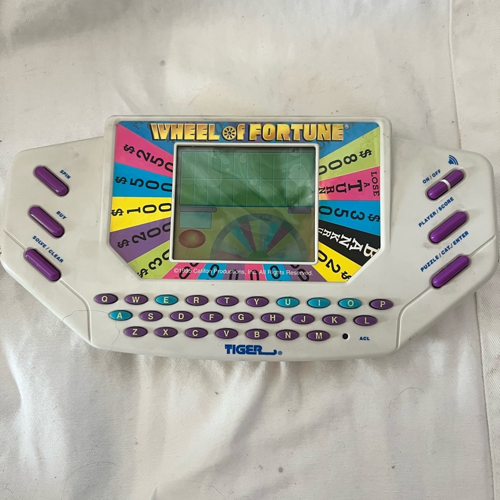 Vtg 1995 Tiger Electronics Wheel Of Fortune Handheld Game w/Cartridge+Bat Tested